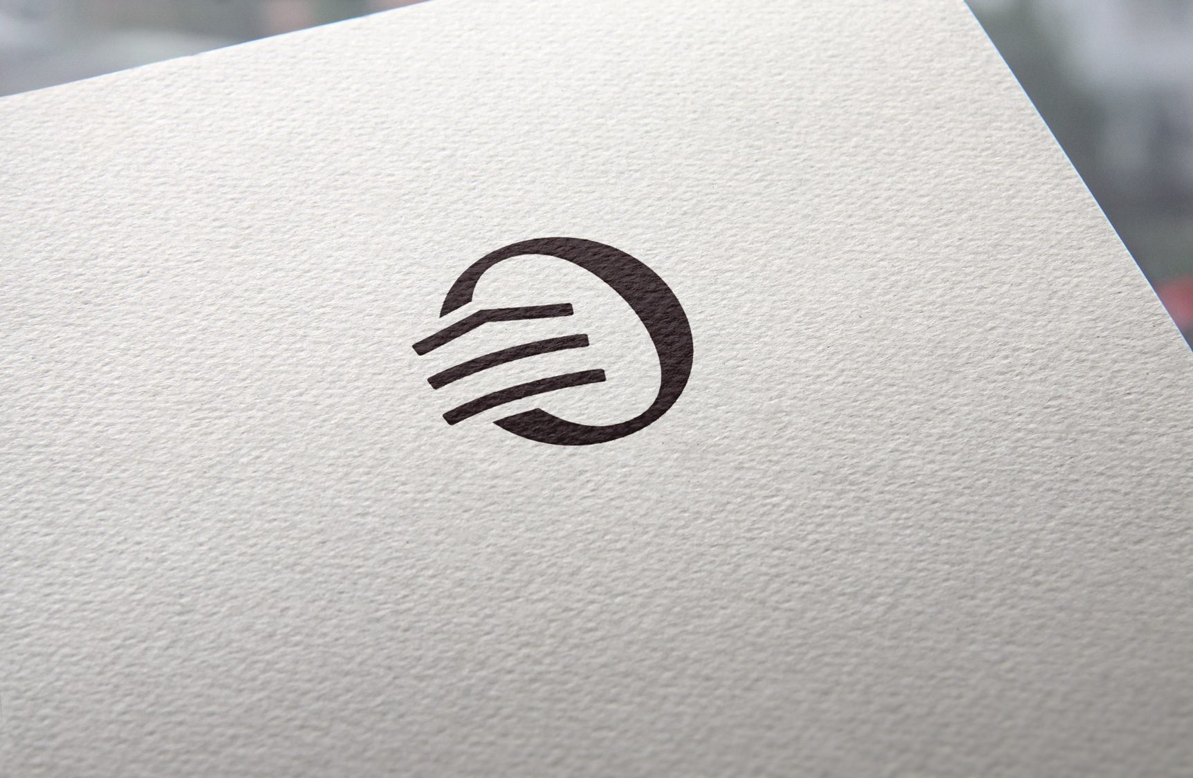 The Panoramic mark letterpressed into textured cream paper
